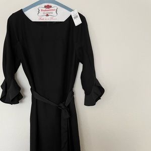 Brand new with tags never worn size 2 black dress mid calf dress with sleeves